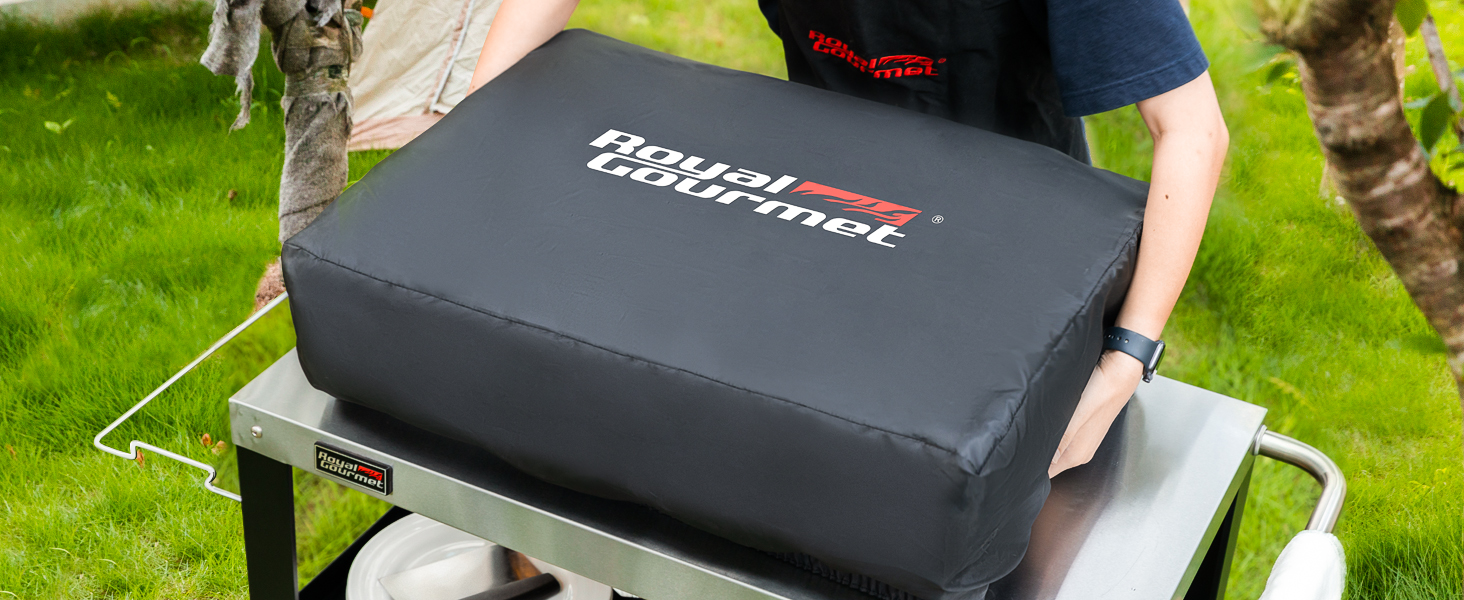 avec le logo « jardinite » sur un support en métal à l'extérieur. Il s'agit apparemment d'une housse de gril ou d'un accessoire pour la cuisine en extérieur.