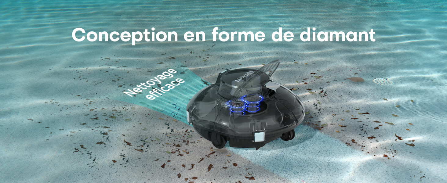 Appareil sous-marin au design en forme de losange posé sur un fond sableux. Corps circulaire sombre avec des lumières bleues, entouré de débris épars. La superposition de texte mentionne une conception en forme de losange.